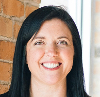Service team member Sophie Hartwell, head of customer support, in portrait form